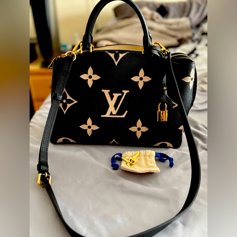 Louis Vuitton
Petit Palais Handbag Bicolor Monogram Empreinte Giant